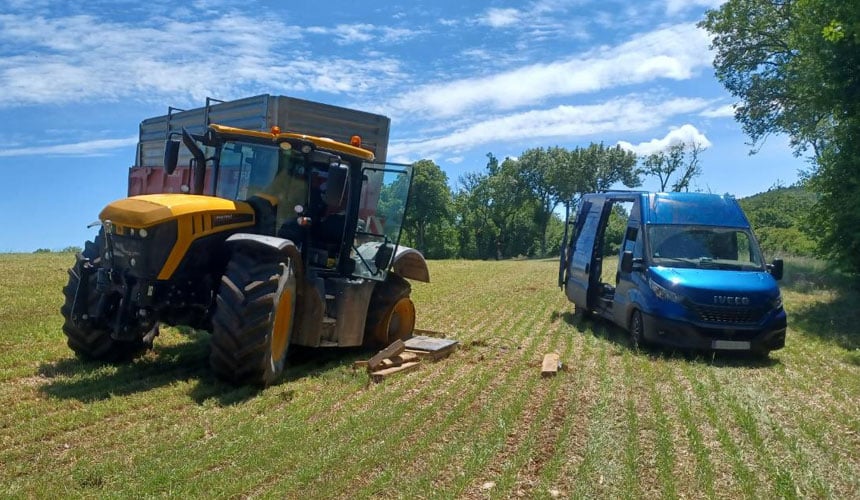 Repairing a tyre that has come off the rim on sloping land