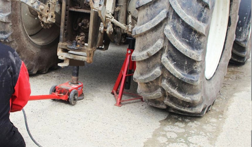 Use axle stands as backup for jack failure